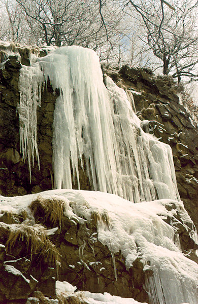An ice-fall on the rock wall under the peak of the Klíč-hill.