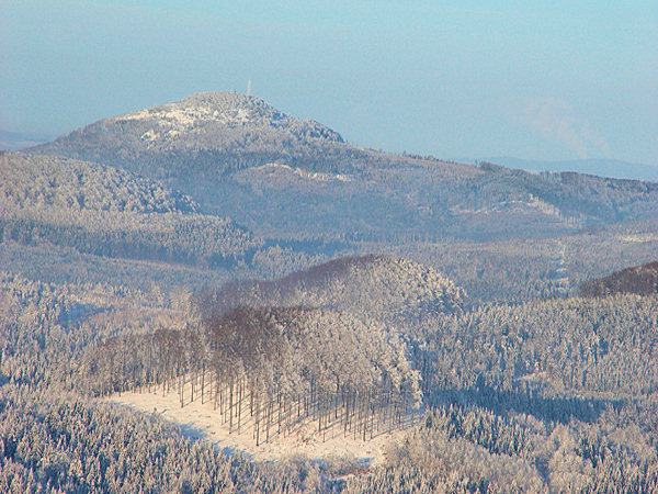 View from the Klíč hill to the Jedlová hill. In the foreground two smaller hills between the hills Velký Buk and Malý Buk.