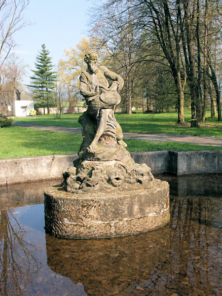 Fountain with a statue of Neptun in the park of Sloup-castle.