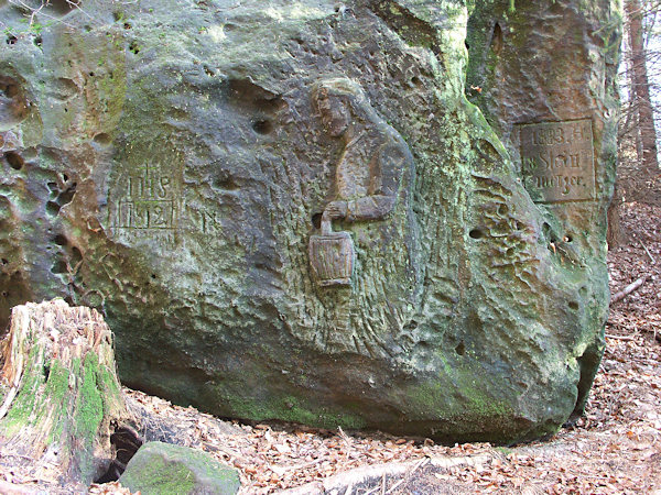 The relief of a young beggar-woman on a rock at the foot of Bouřný-hill.
