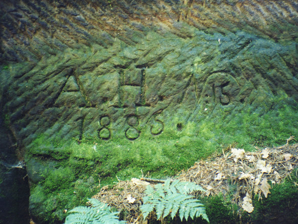 Year 1885 chiselled in the wall of a sunken road of the old way from Kunratice to Drnovec.