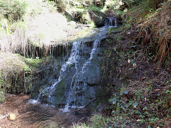 Waterfall Panský vodopád on the Malý Vlčí potok below Kamenný vrch.