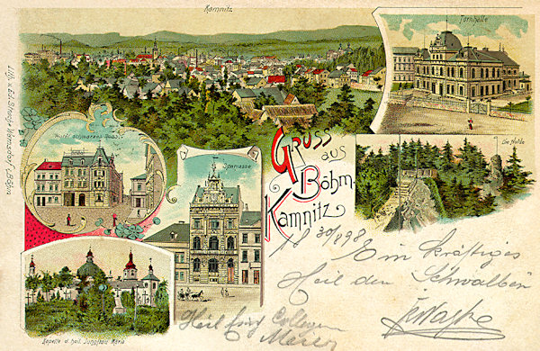 Pohlednice České Kamenice z roku 1898. Pod celkovým pohledem je tehdejší hotel „Schwarzes Ross“ (Černý kůň) na rohu náměstí, budova spořitelny a areál Mariánské kaple s bývalým hřbitovem. Na pravé straně pohlednice je tělocvična a skalní vyhlídka na Jehle.