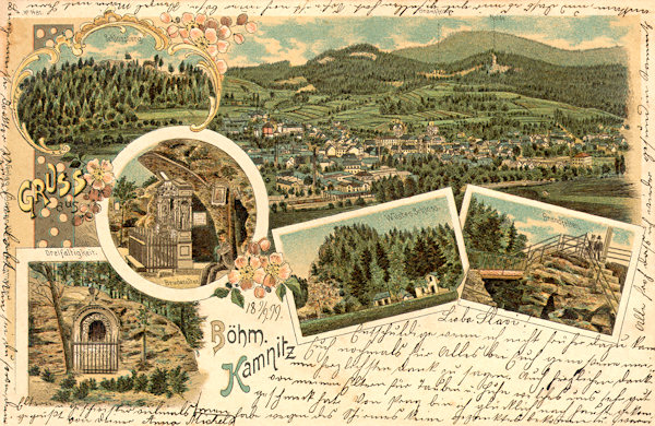 This picture postcard from 1899 shows several of the most interesting places in the environs of Česká Kamenice. On the left side there is the Zámecký vrch, the Brethren's altar and the Trinity-Chapel in the sandstone rocks, on the right side under the overall view of the town the ruins of the Pustý zámek castle and the rock Ponorka with its look-out platform.