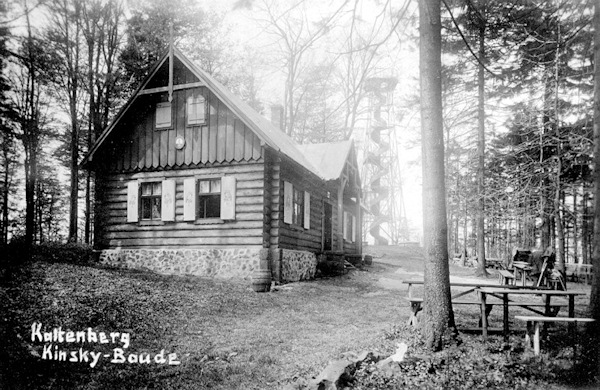 This picture postcard shows the timbered chalet of duke Kinsky with the look-out tower in the background.