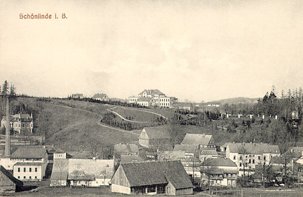This picture postcard shows the houses in the valley of the Křinice-brook in the west of the market place. On the hill to the right there is the area of the former Calvary on the Kostelní vrch (Church-hill) with the Stations of the Cross, the prominent building in the background is the hospital.