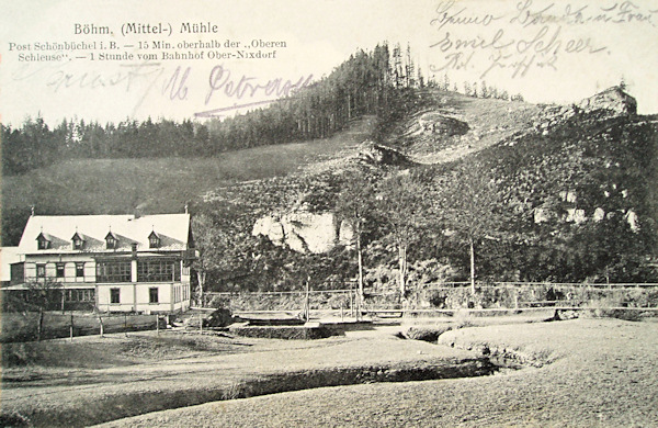 This picture postcard shows the former Český mlýn (Czech mill) as seen from the Northwest.