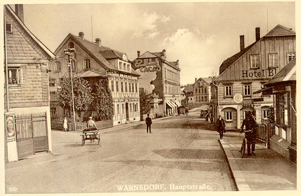 On this picture postcard the at present Národní ulice named street with the former hotel „Blauer Stern“ on its corner with the Husova ulice-street (right).