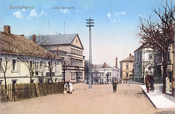 A postcard of Kamenický Šenov from 1919 showing the northern half of the town-square with the former hotel Mercantile.