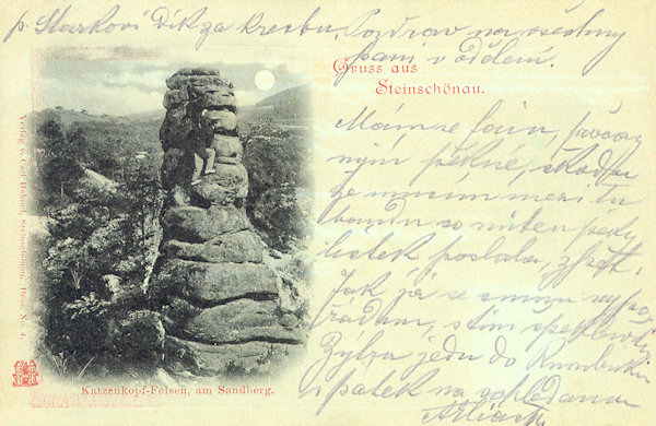 On this picture postcard from 1905 the Kočičí skála (cat´s rock, originally in German: „cat´s head rock“) in the rocky crest between Dolní Šenov and Prysk.