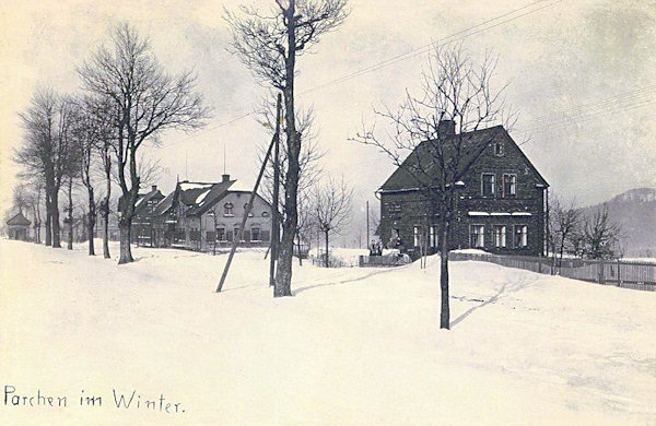 This winter picture postcard from 1924 shows the houses standing along of the main road near of the Panská skála rock. The trees standing along of the road had been in 2006 sawn down in the course of the reconstruction of the road and buildung of the car park.