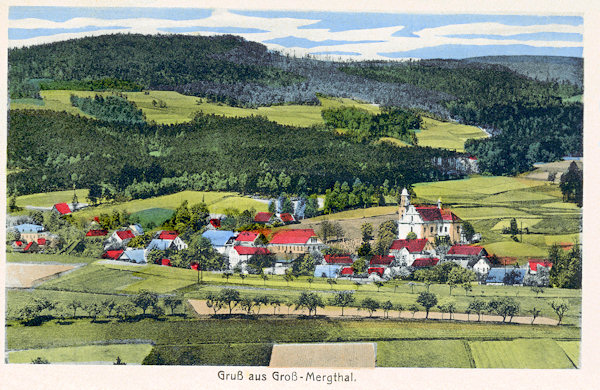 This picture postcard shows the centre of the village with the church of St. Mary Magdalene as seen from the south.