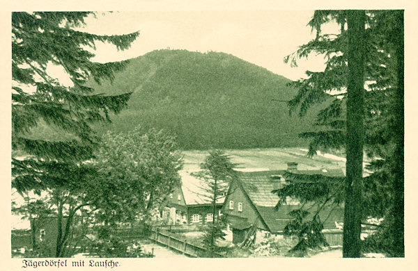 On this picture postcard from the twenties of the 20th century we can see, that in former years originally between the village and the foot of Luž-hill a broad strip of arable land existed.