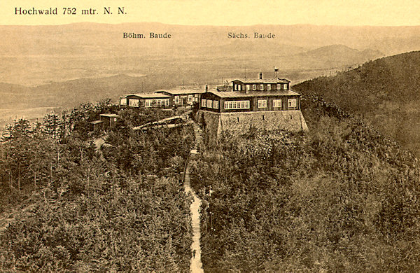 On this picture postcard the southern peak of the Hvozd hill is shown at a time where both its chalets were standing. The German chalet from 1889 (in the foreground) underwent later a reconstruction, the Czech chalet, 11 years younger (in the background) after World War Two burnt out and at present there remain only rests of its foundations.