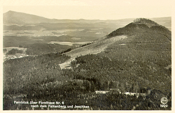 Sokol near Petrovice</b><br>This postcard from 1935 shows the look-out from Hvozd hill over the Sokol hill near Petrovice to the Ještěd (at the left on the sky-line). In the woods of the foreground is the solitary house with the woodskeeper's lodge 