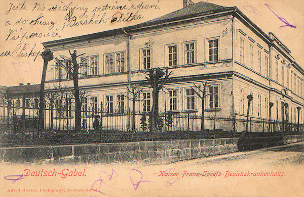 This picture postcard shows the former Emperor Franz Joseph's district hospital, the building of which in the Tyršova ulice-street to-day serves as Centre for the medical care of long-time ill persons.