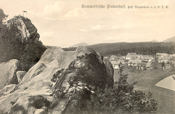 On this picture postcard on the left side there is the look-out rock Havran, projecting from a hill on the southern border of the village Polesí.