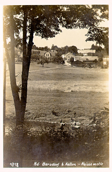 This picture postcard from the years between the wars shows the houses standing in the lower part of the village not far from the Nisa-river.