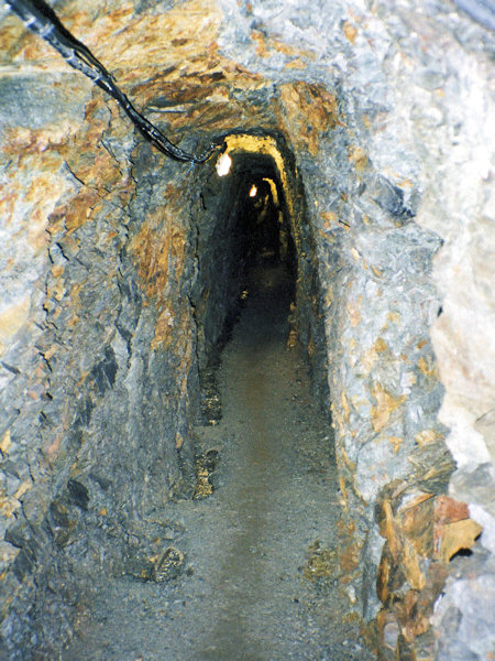 In the rock mass of the Křížová hora near Jiřetín pod Jedlovou are old adits, which mined relatively poor ores with copper, lead, zinc and silver. The longest adit St. John the Evangelist is about 650 m long.
